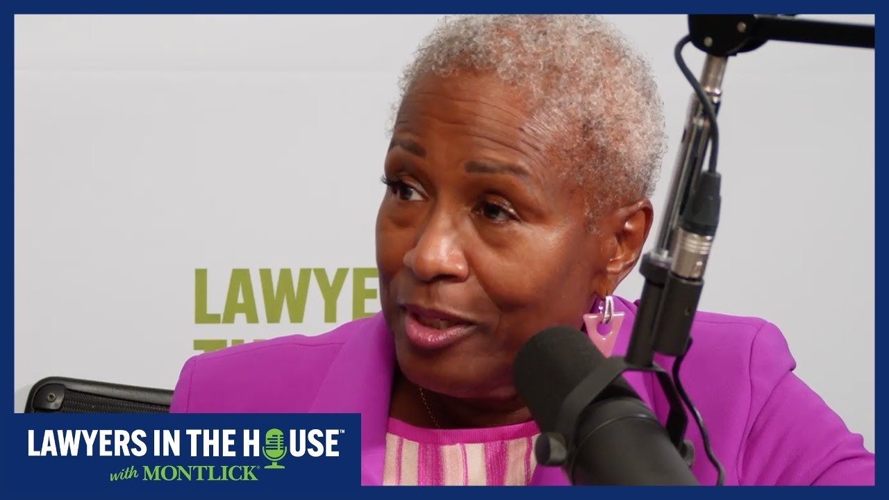 Renowned attorney speaking into microphone, representing "Lawyers in the House" podcast or radio show