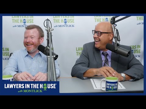 Two smiling attorneys recording a podcast titled "Lawyers in the House" to discuss legal issues. Alt text focuses on describing the key elements of the image (two attorneys recording a legal podcast) without identifying the individuals, in a concise way suitable for an attorney's website.